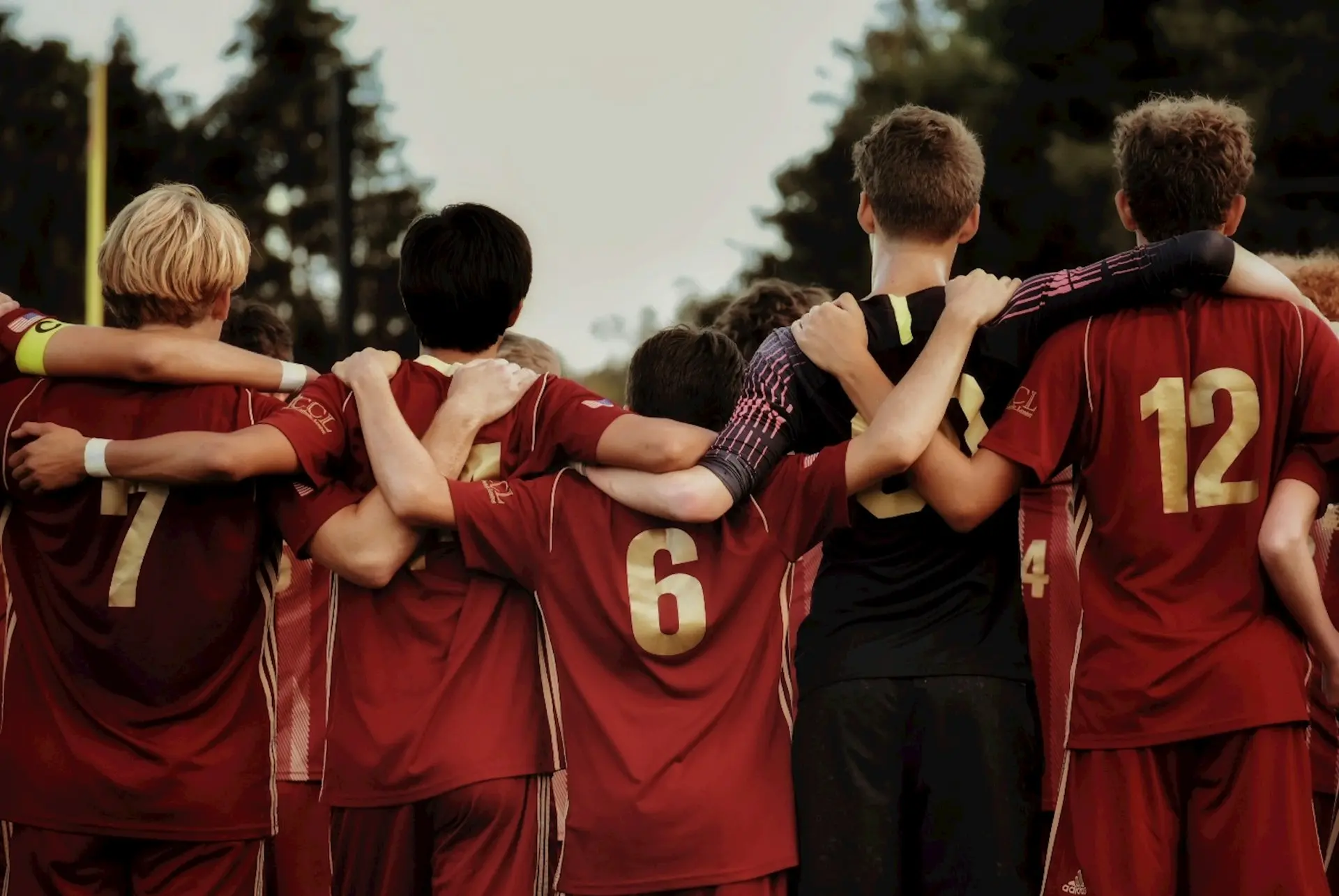 boys in red jersey shirts